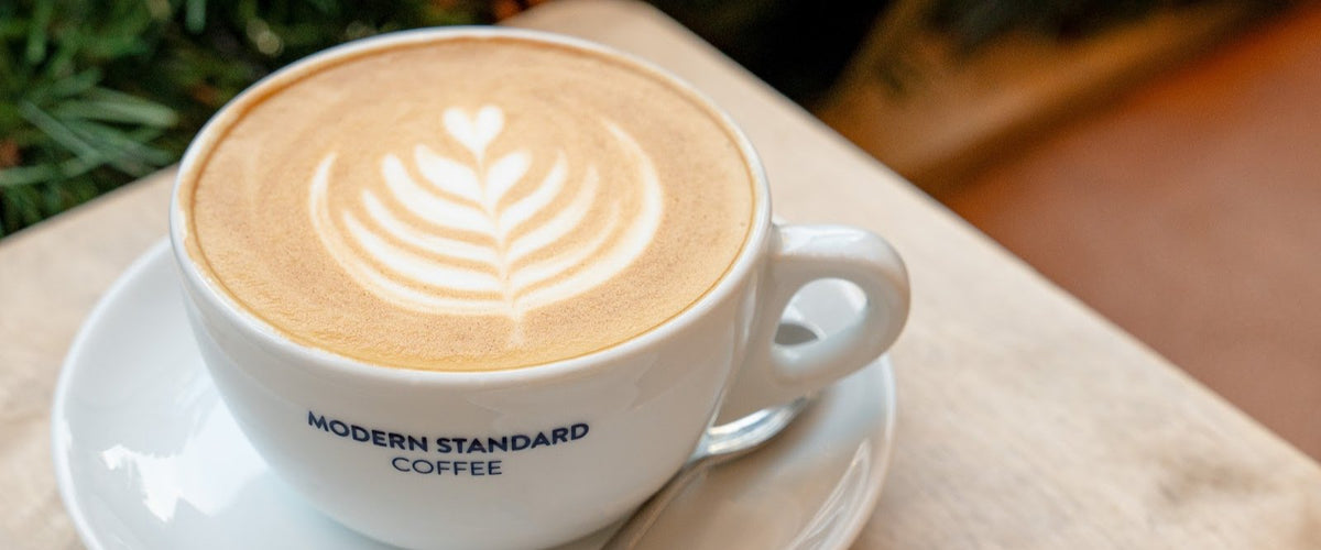 Latte with latte art at Modern Standard Coffee