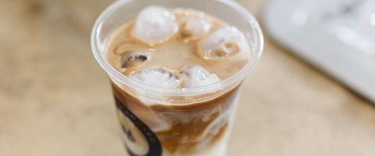 Iced vanilla latte in a Modern Standard cup