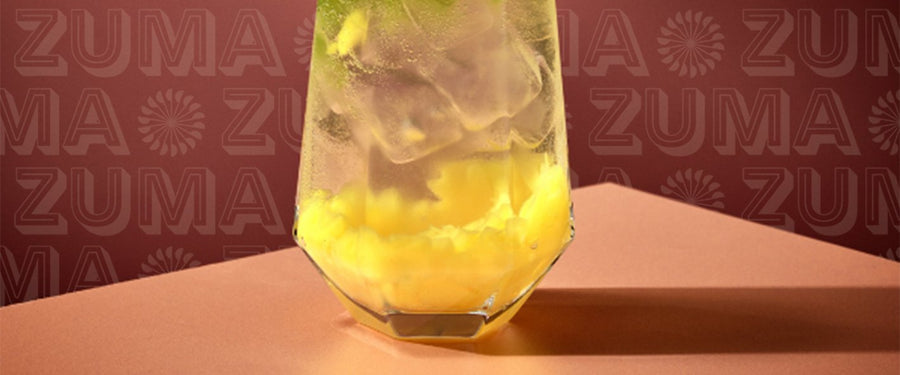 Matcha spritz in a glass with ice
