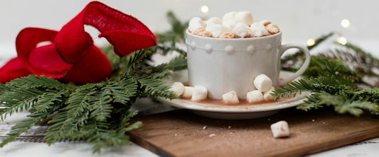 Christmas hot chocolate with marshmallows and festive toppings