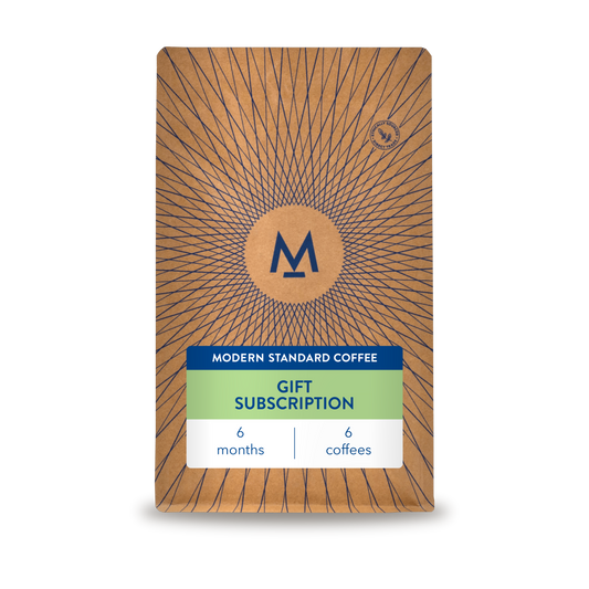 6 month gift subscription: a Modern Standard Coffee bag with a green gift subscription label, 6 months, 6 coffees