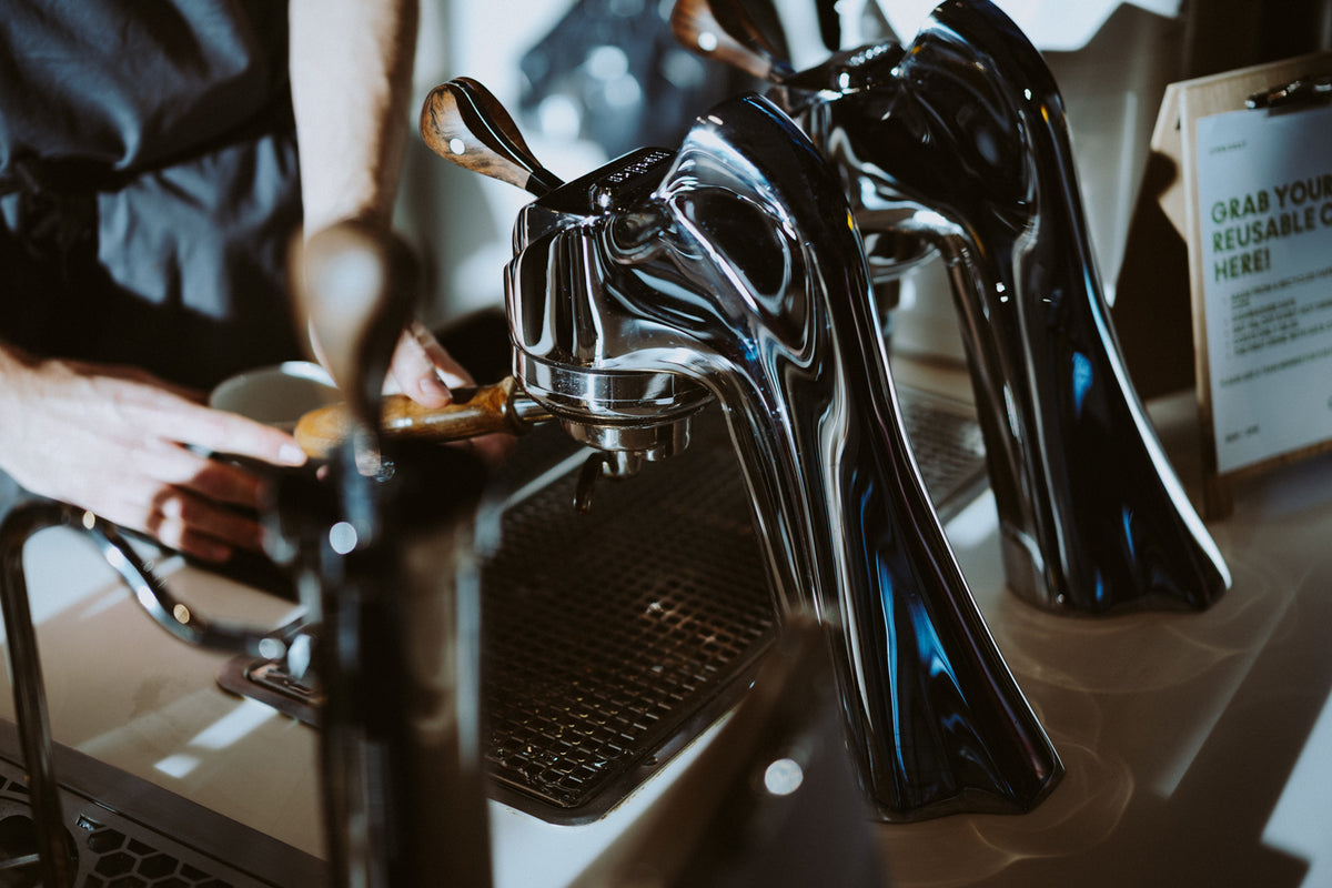 Barista pulling an espresso shot on the Modbar at Channel 4