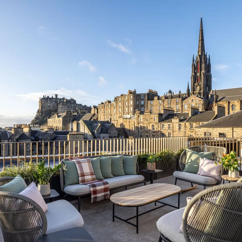 A hotel roof terrace looking over Edinburgh's Old Town
