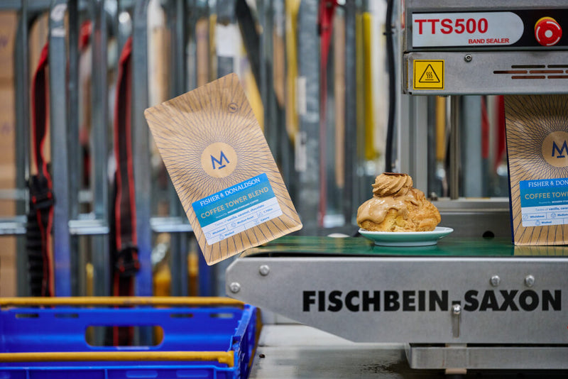 A bag of Modern Standard coffee and a pastry in the Fisher & Donaldson bakery