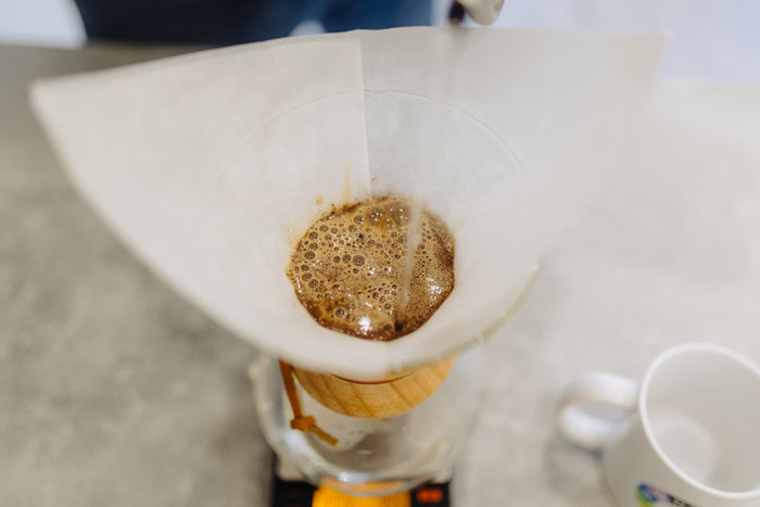 Coffee blooming in the Chemex after the first pour