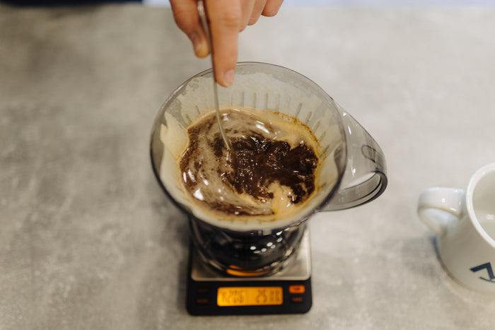 Stirring the coffee in the Clever Dripper