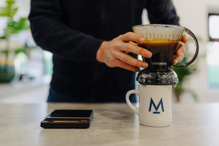 The Clever Dripper draining into a mug