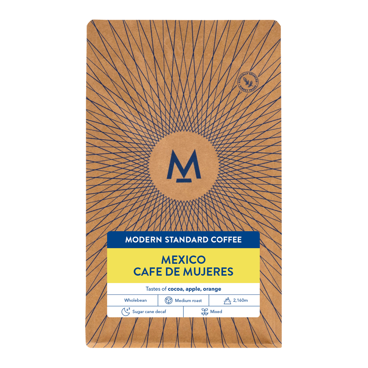 A package of Modern Standard Coffee's Mexico Cafe de Mujeres blend, featuring a brown kraft-paper style design with a blue sunburst pattern, a central circular logo, and a yellow and white label at the bottom.