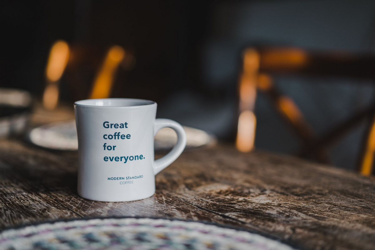 A white Modern Standard mug printed with Great coffee for everyone
